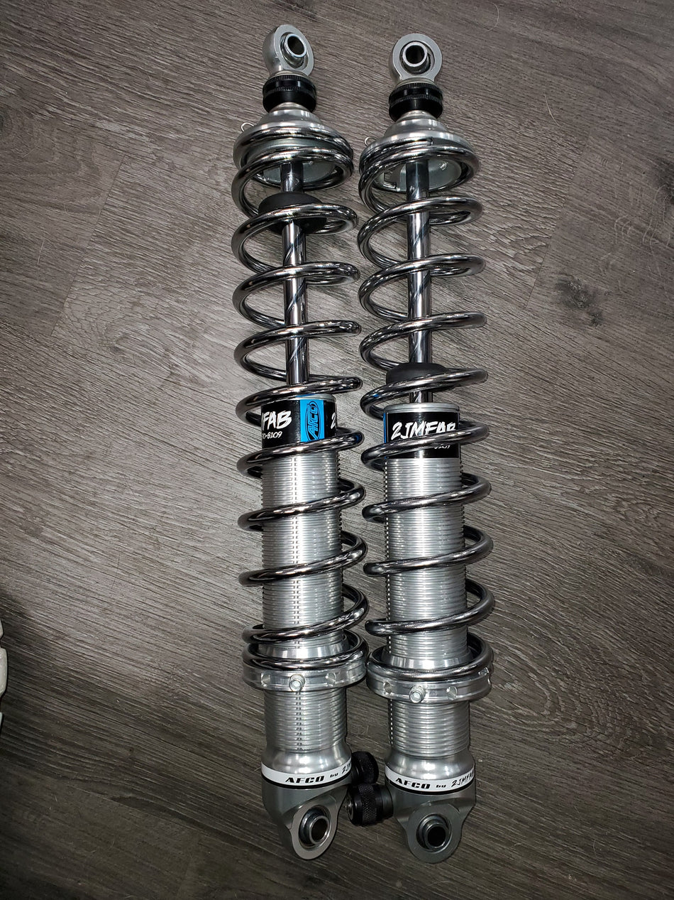 NO PREP-  Double Adjustable shocks (rear)